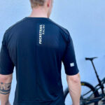 Ein bedrucktes ORTOVOX® T-Shirt von hinten